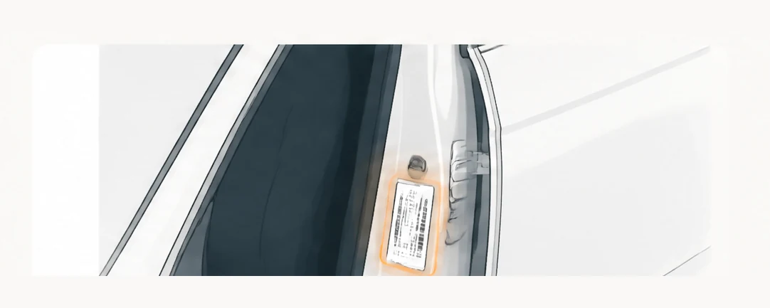 Illustration of an open driver’s door showing the VIN sticker highlighted on the door-jamb pillar